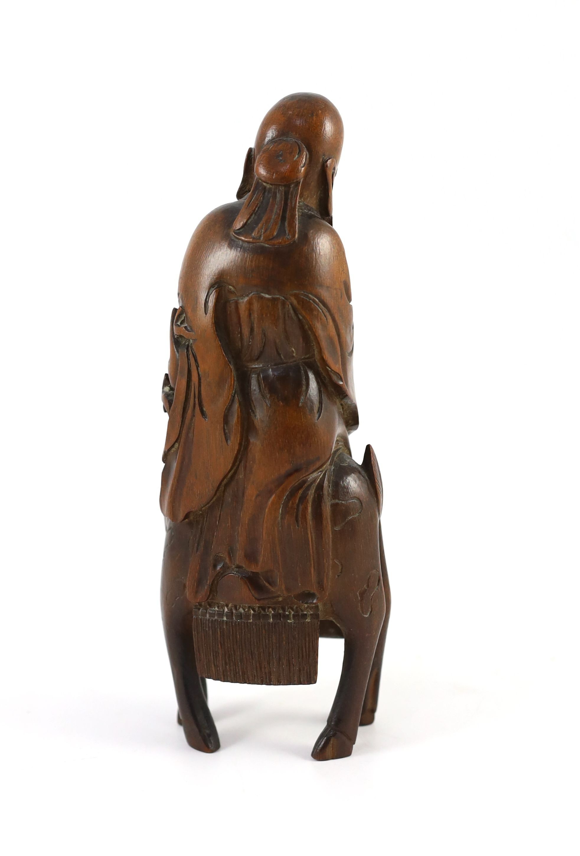 A Chinese bamboo group of Shou Lao riding a deer, 18th/19th century, 21cm high